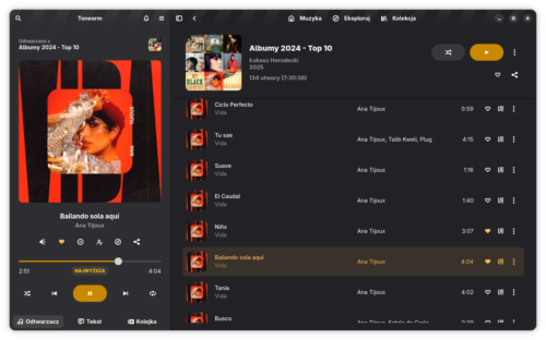 Okno Tonearm tym razem z ciemnym stylem i źółtymi akcentami na pasku przewijania, zaznaczonej ikonce serca oznaczającej utwór dodany do kolekcji i przyciski odtwarzania i pauzy. Otwarzana jest piosenka „Bailando sola aqui”  z płyty „Vida” Any Tijoux.